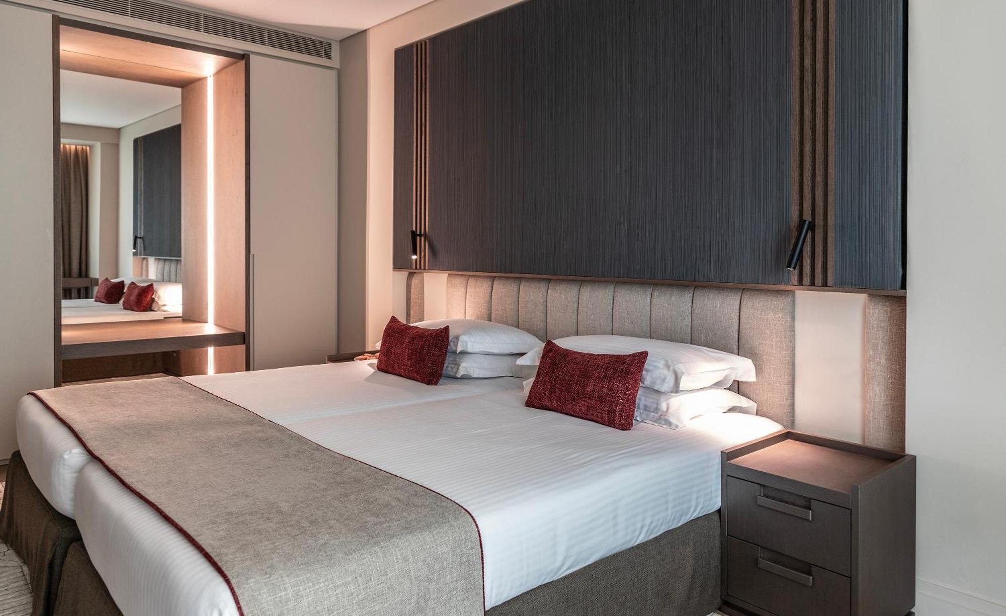 Hotel NJV Athens Plaza Exterior foto A bedroom at the hotel