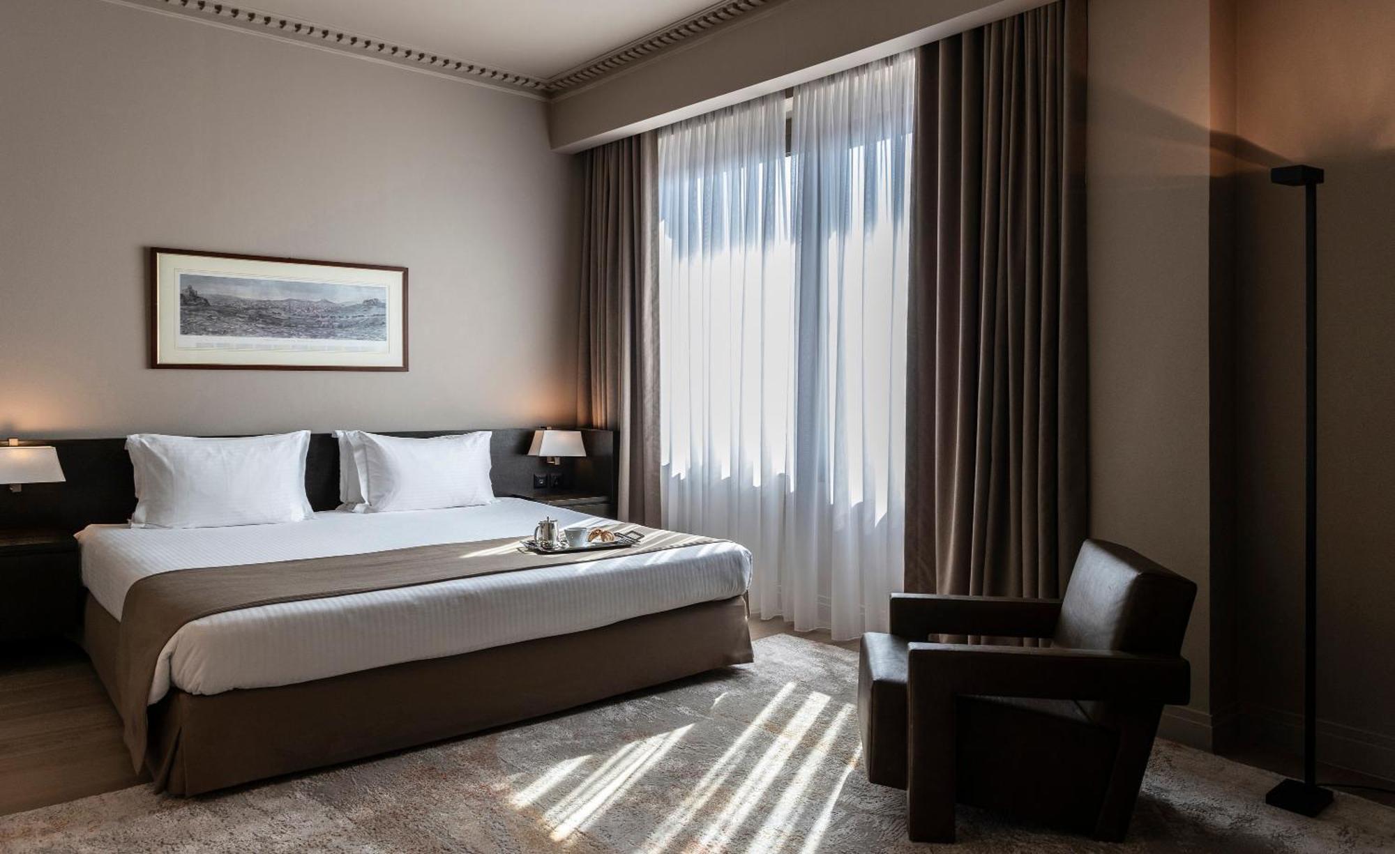 Hotel NJV Athens Plaza Exterior foto A room at the hotel