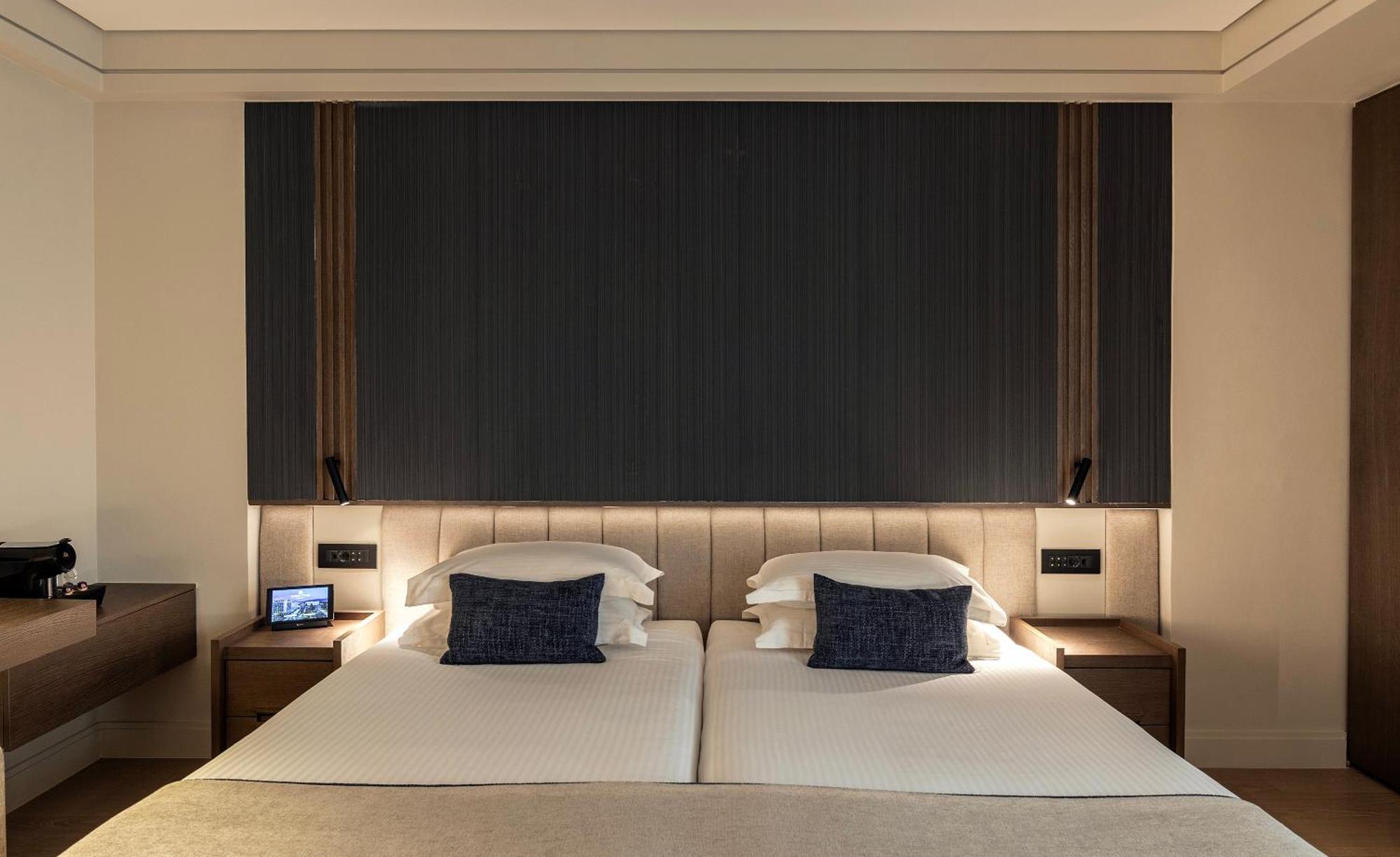 Hotel NJV Athens Plaza Exterior foto A bedroom at the hotel