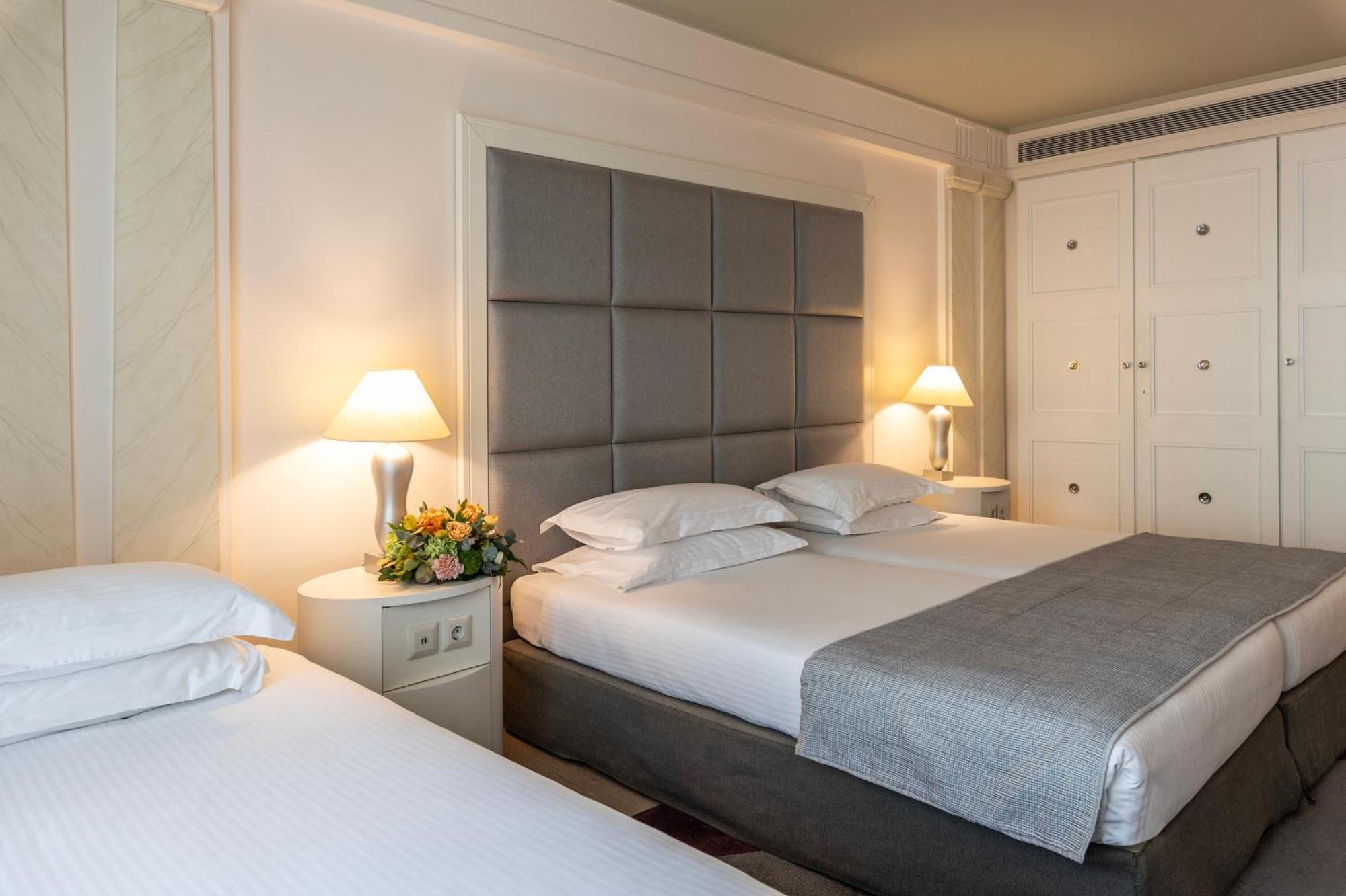 Hotel NJV Athens Plaza Exterior foto A bedroom at the hotel